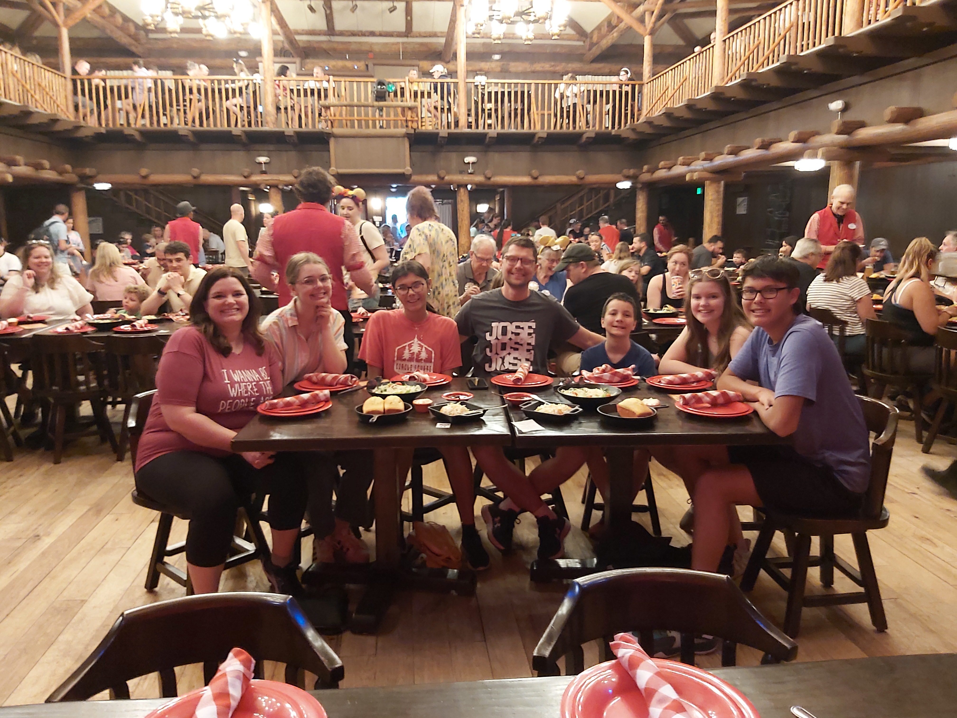 My family smiling and dining at Hoop-Dee-Doo Musical Revue